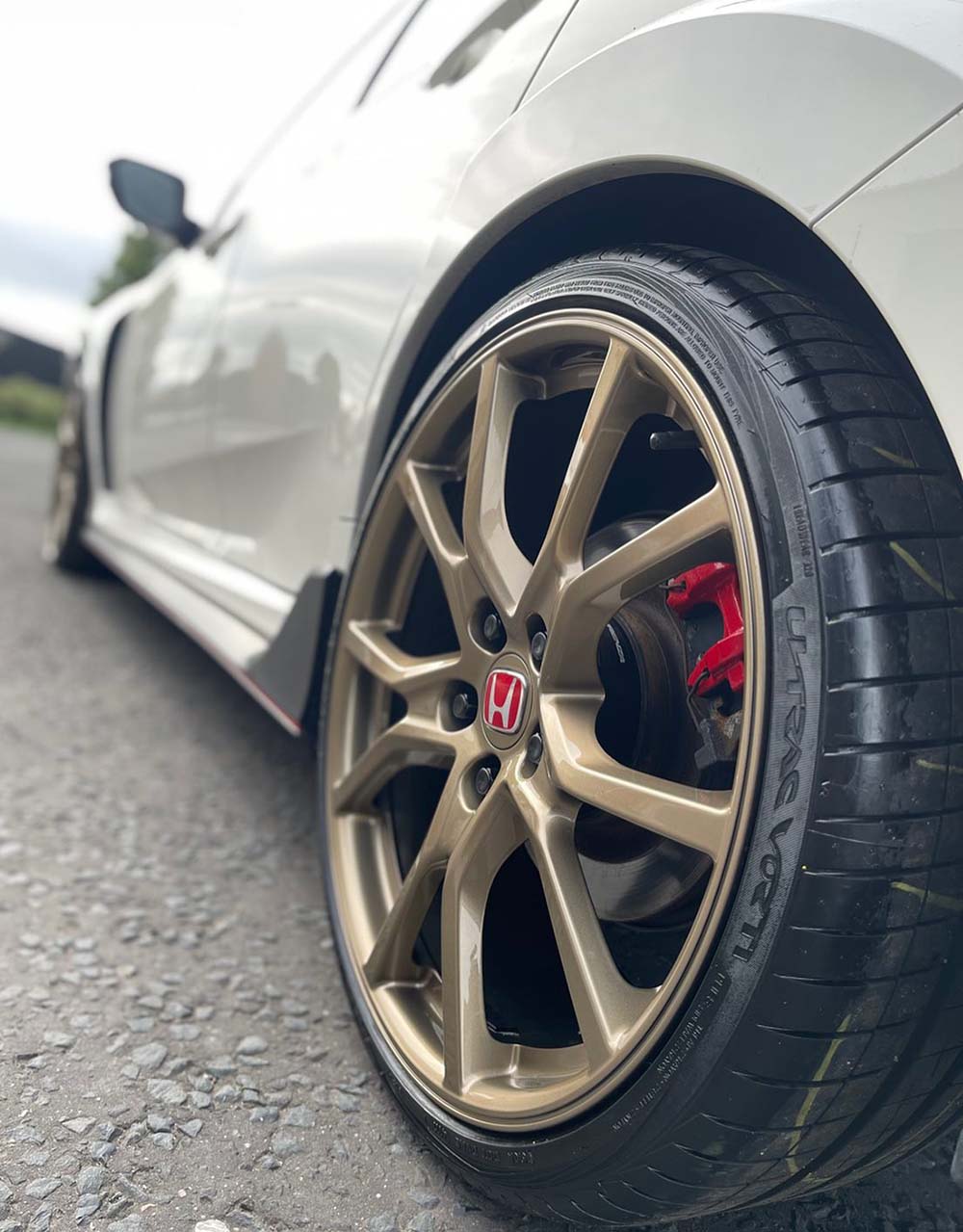 Gold Honda alloy wheel on Civic Type R